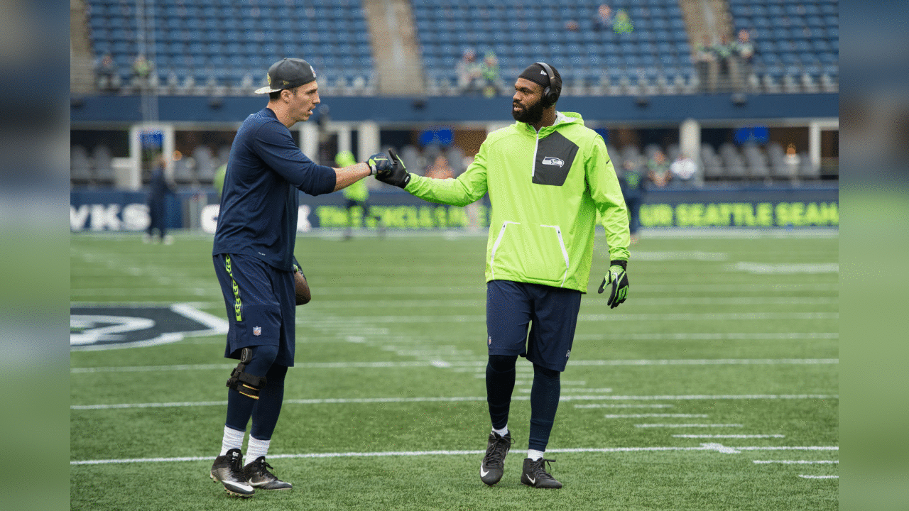 Tight ends Luke Willson and Marcus Lucas shake hands during early warmups prior to the Monday Night Football game against the visiting Buffalo Bills.