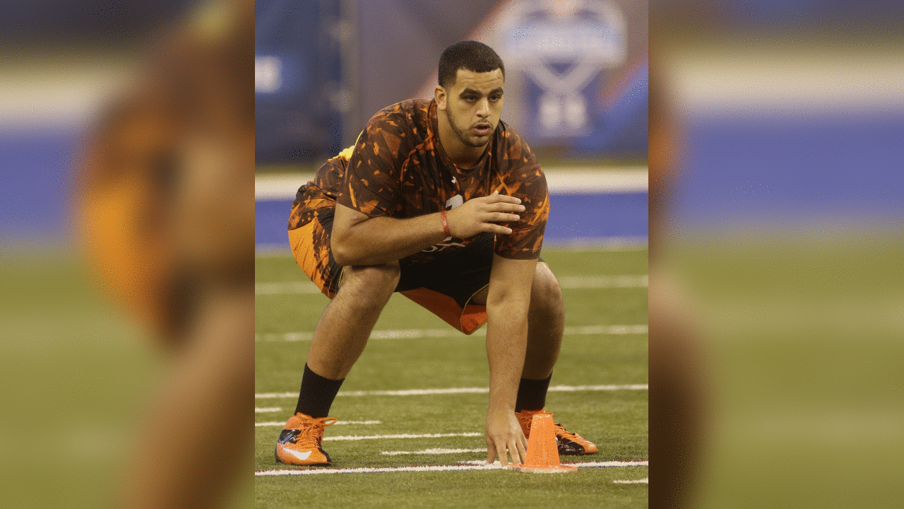 Virginia offensive lineman Oday Aboushi goes through a drill during the NFL Combine in Indianapolis Saturday, Feb. 23, 2013. (AP Photo/Dave Martin)