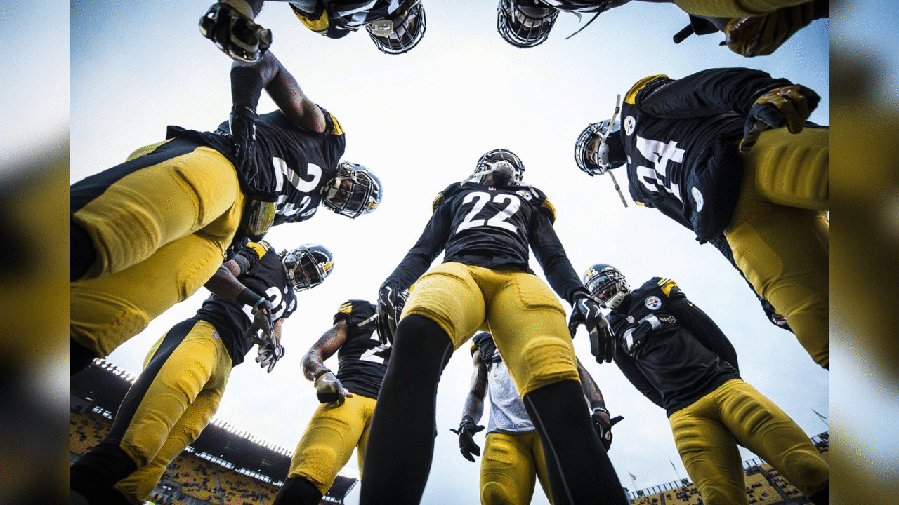 Defensive backs huddle