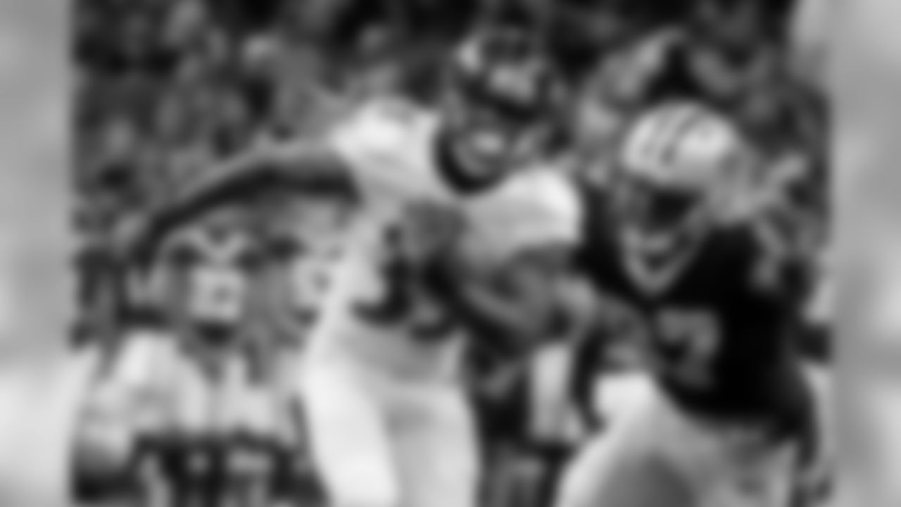 RB Taquan Mizzell