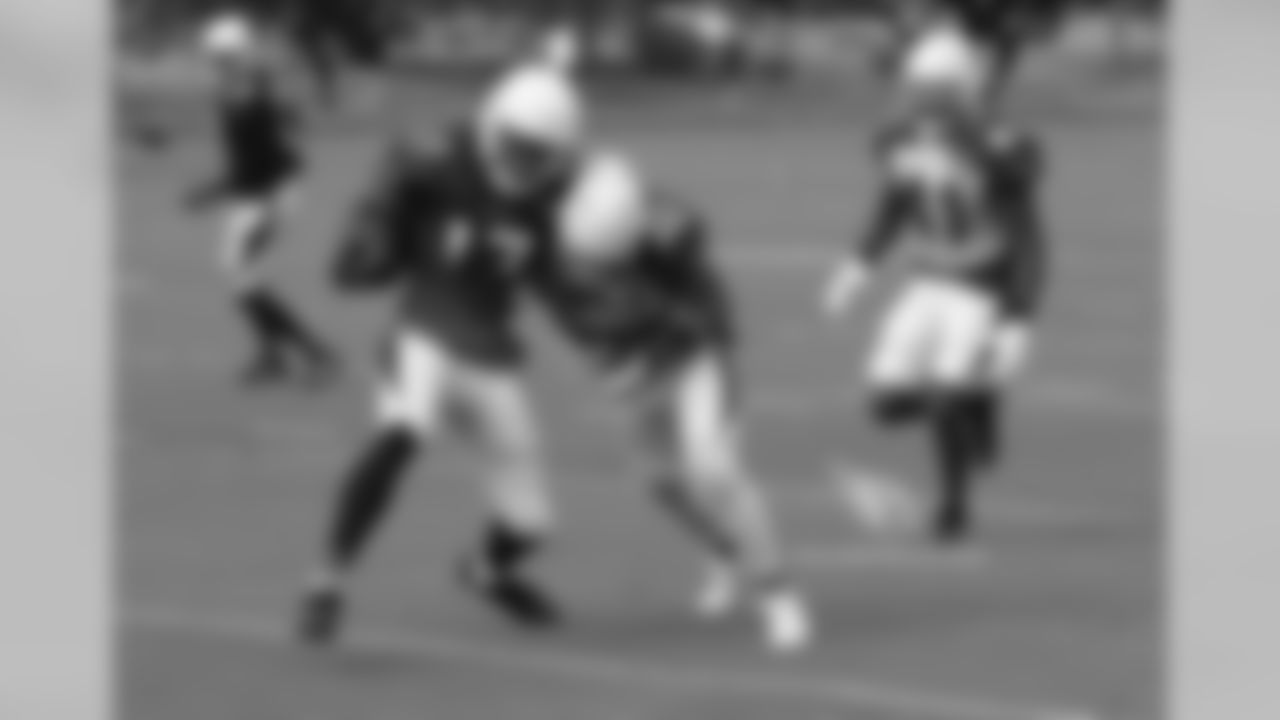WR Larry Clark is hit by S Tyrann Mathieu