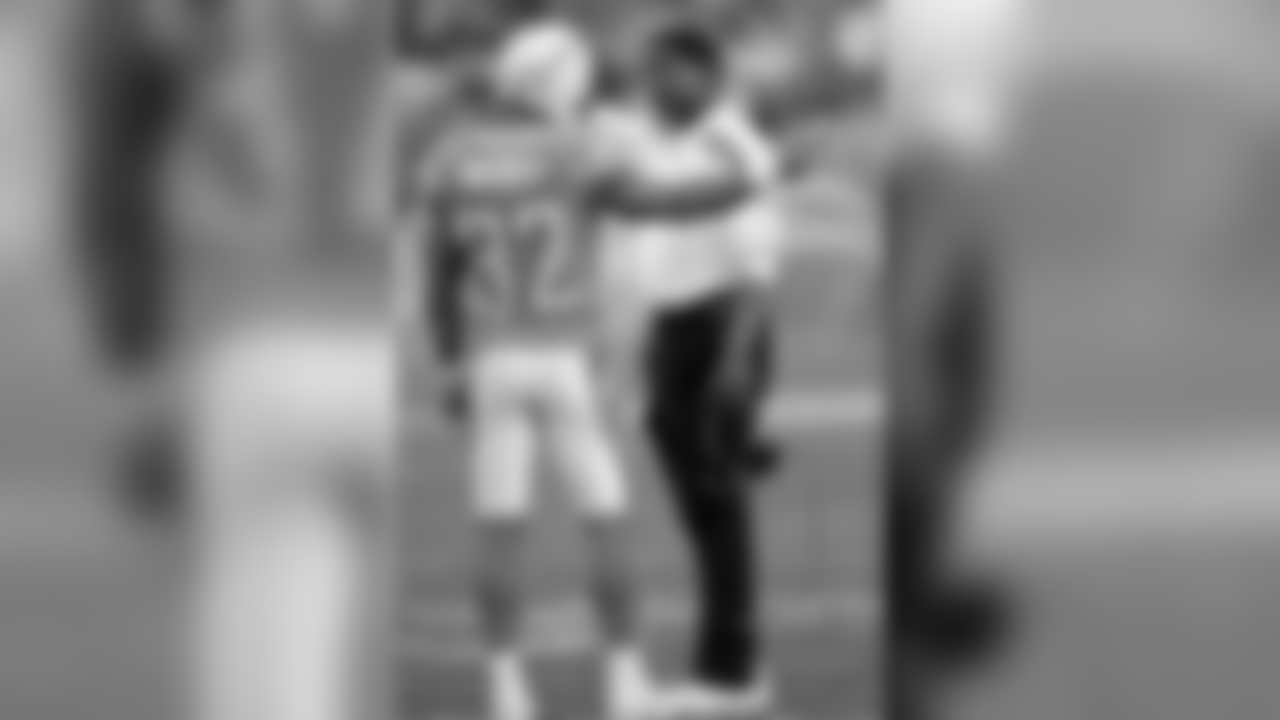 Wilks in 2011 with Chargers S Eric Weddle