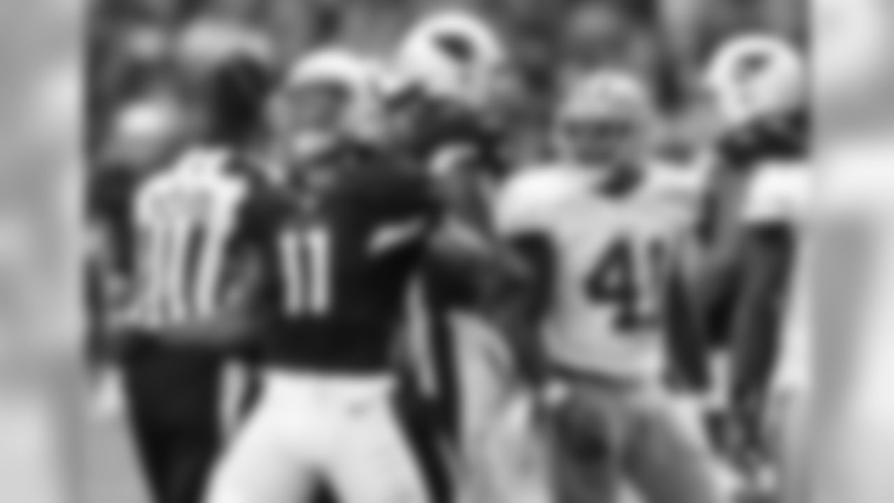 2014: Cardinals WR Larry Fitzgerald celebrates a first down catch