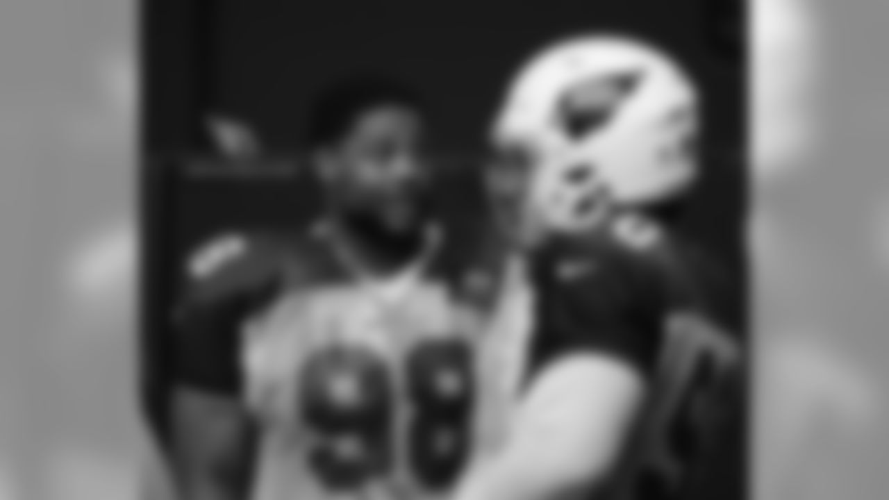 DT Corey Peters talks to DT Robert Nkemdiche