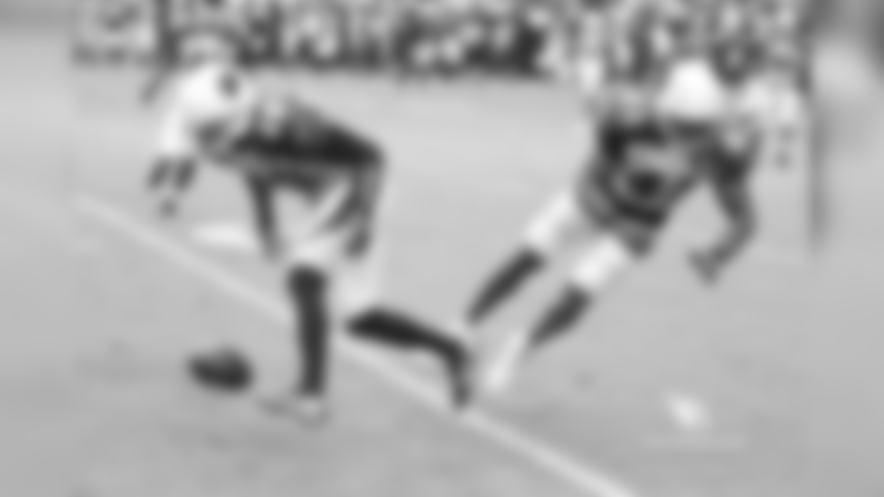 CB Justin Bethel (left) and S Antoine Bethea while going for an interception