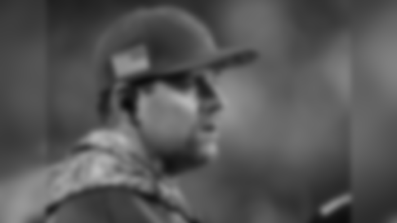 Injured QB Carson Palmer watches from the sideline