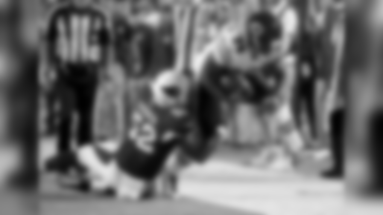LB Zaviar Gooden holds on