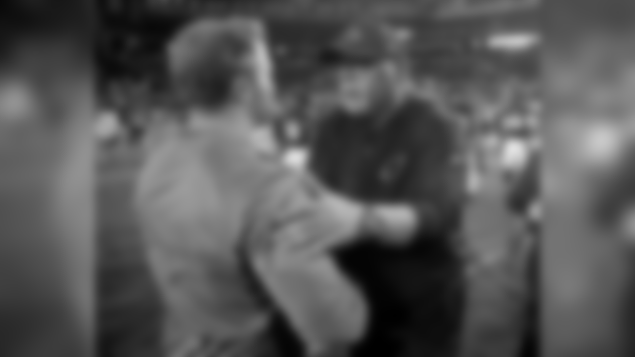Cardinals head coach Bruce Arians (right) speaks with Rams head coach Sean McVay (left) after the game