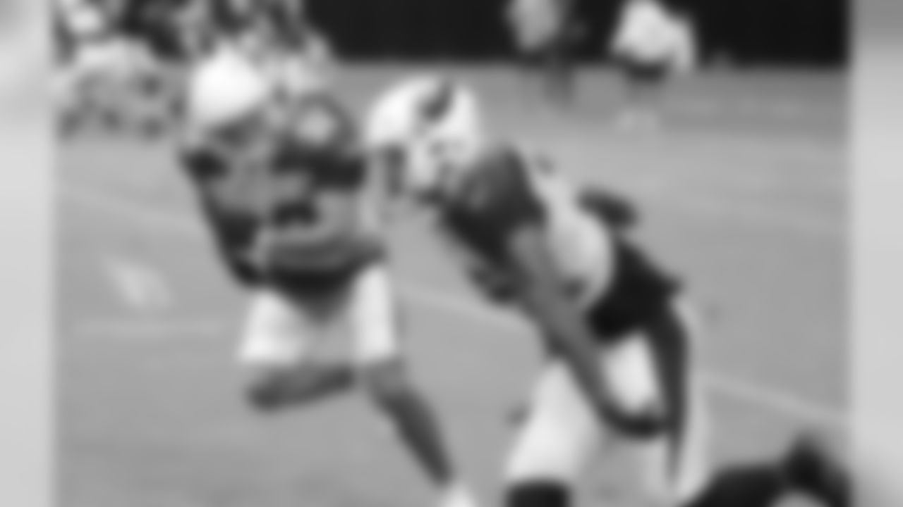 S Tyrann Mathieu races with S Budda Baker