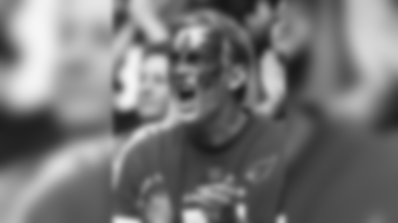 A Cardinals fan makes some noise in University of Phoenix Stadium