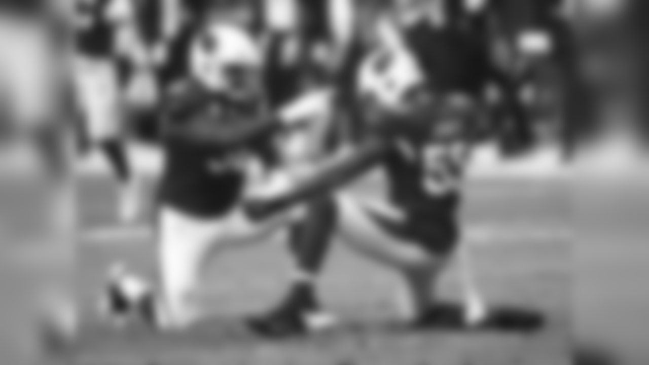 Chandler Jones (right) celebrates a stop with DL Frostee Rucker (left)