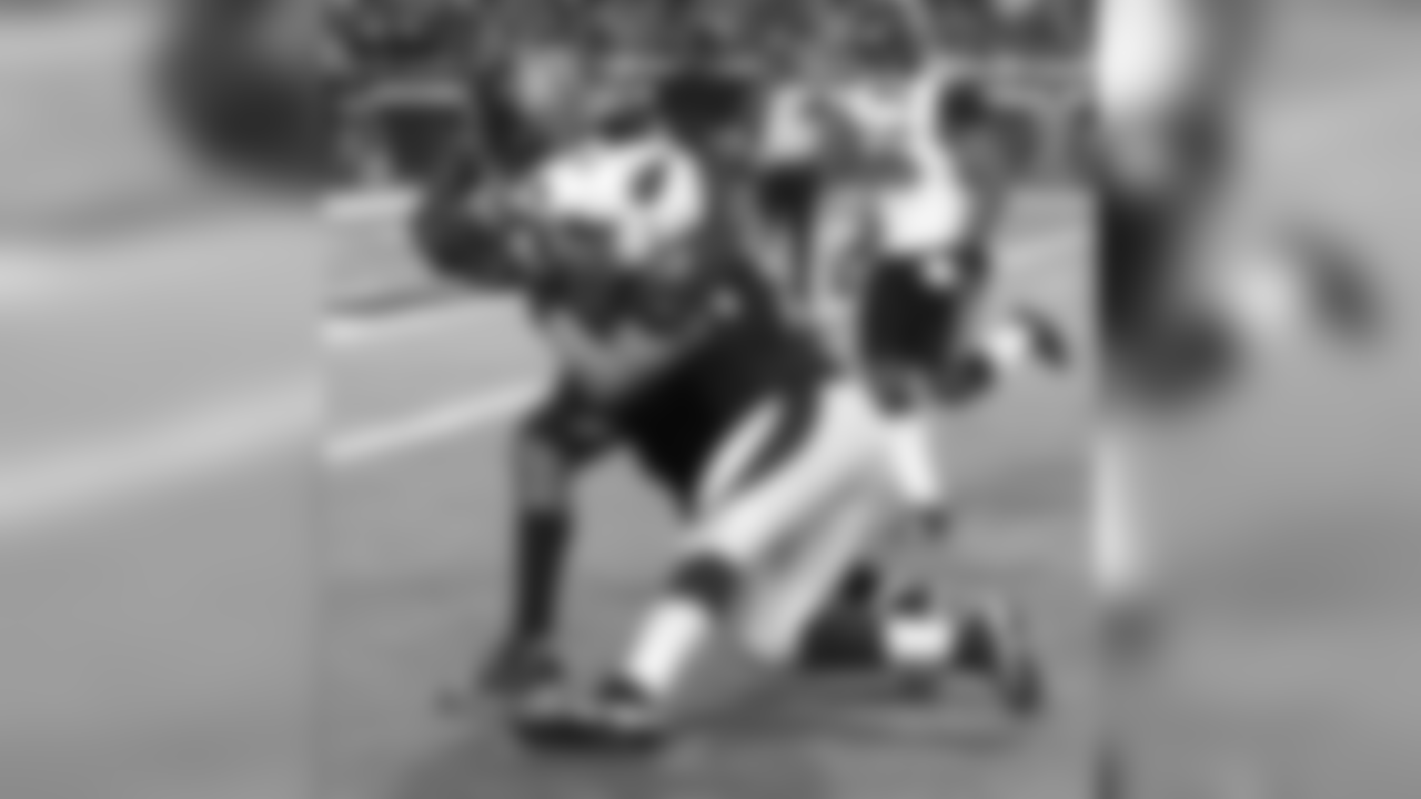 T John Wetzel attempts to take down Jaguars DE Calais Campbell as he runs in a recovered fumble