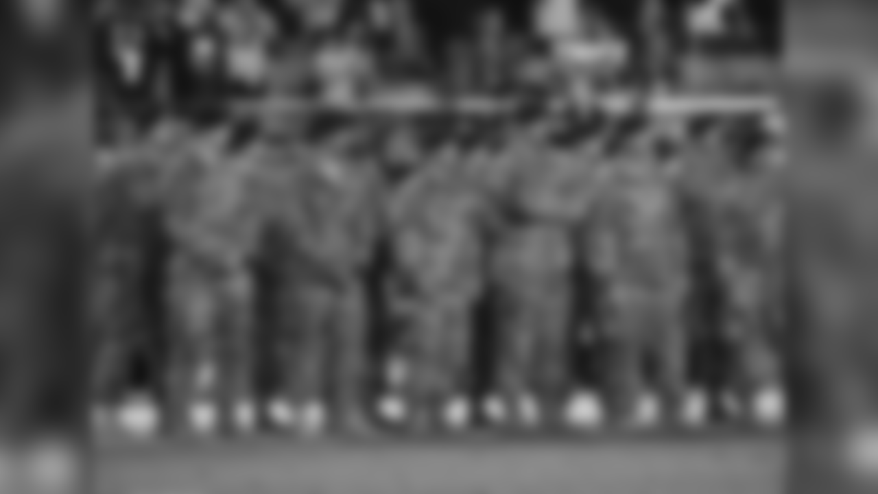 Service members during the halftime presentation