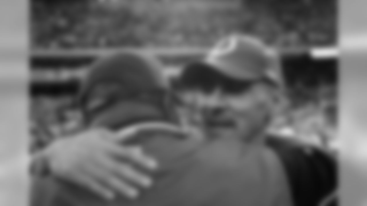 2006: Colts coach Tony Dungy embraces Cardinals coach Denny Green