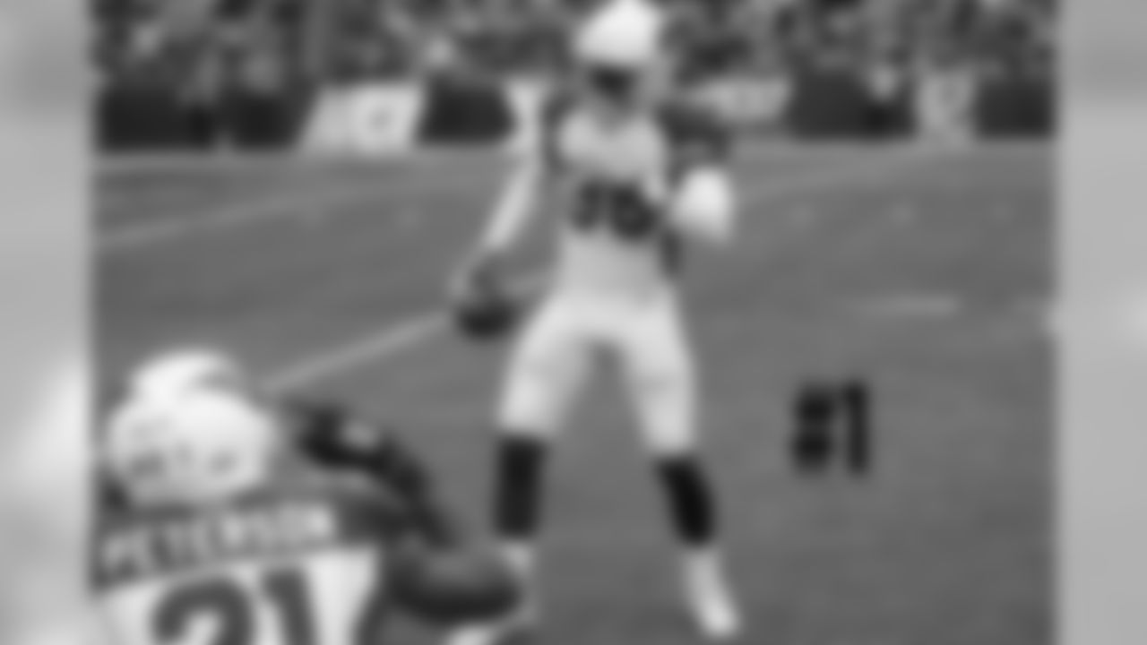 S Budda Baker gets "photographed" by CB Patrick Peterson afetr a fumble recovery