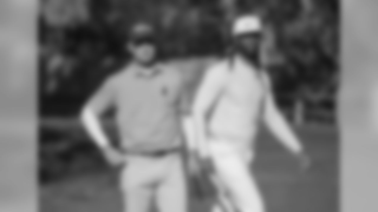 WR Larry Fitzgerald (right) with his golf pro, Kevin Streelman