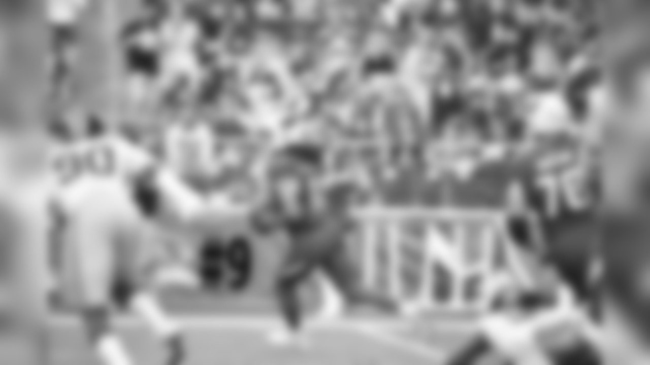 WR Larry Fitzgerald prepares to throw a pass