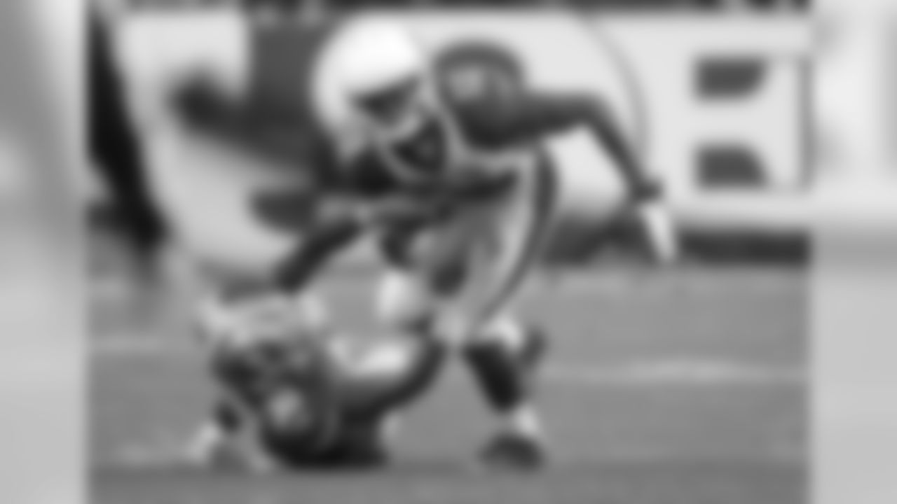 2014: Cardinals WR John Brown catches a pass as 49ers CB Leon McFadden tries to bring him down