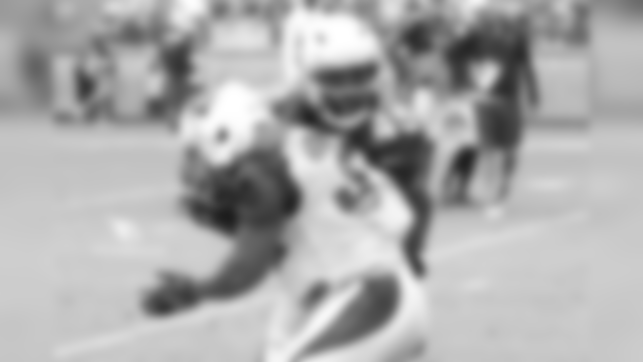 RB James Summers absorbs a hit from CB Jarell Carter