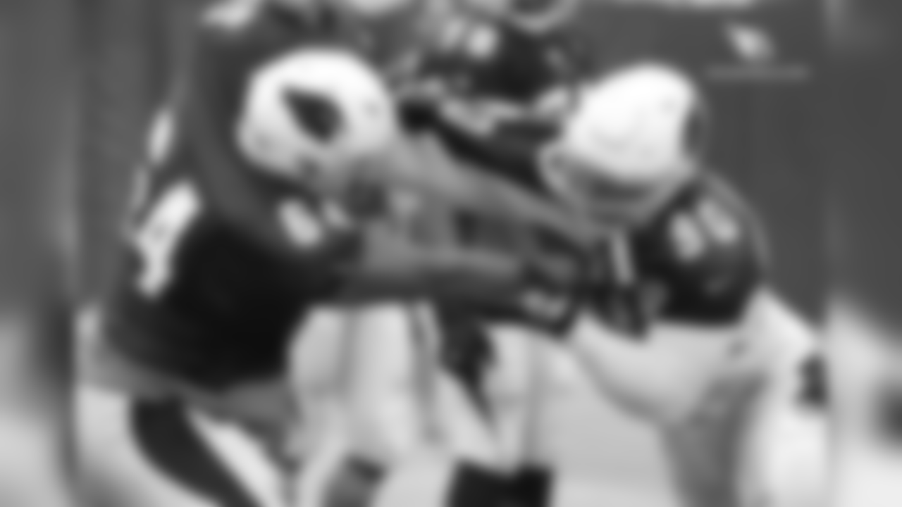 DT Robert Nkemdiche (right) battles G Dorian Johnson in a pass-rush drill