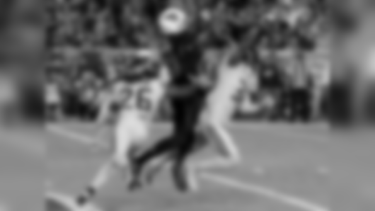 WR Jaron Brown goes up for the catch