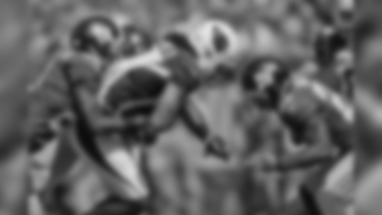 2014: WR Larry Fitzgerald fights for yardage