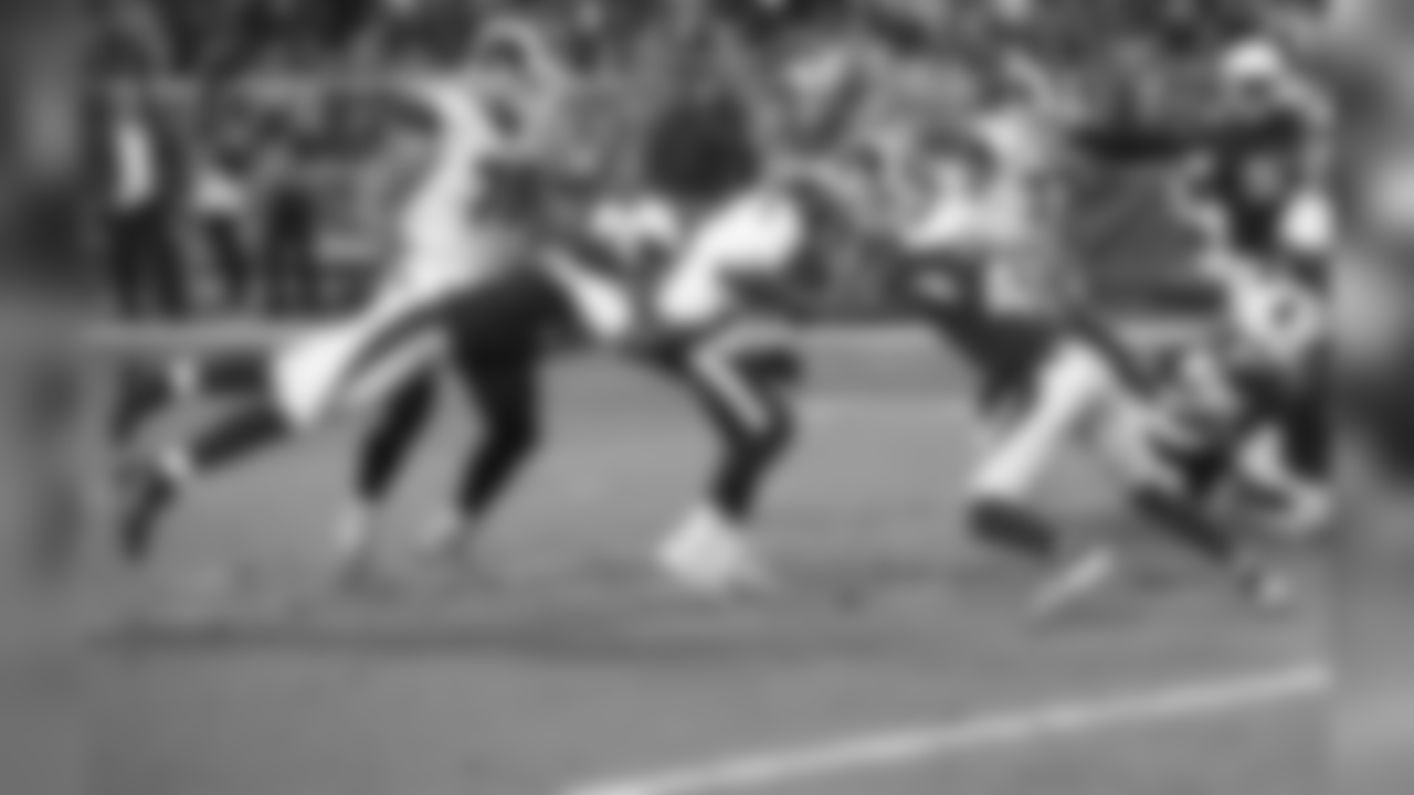 Rams QB Jared Goff pressured by Cardinals LB Karlos Dansby (left) and S Antoine Bethea (right)