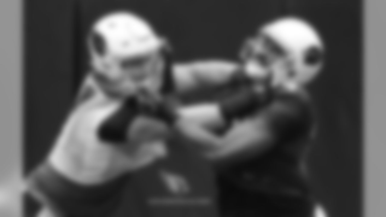 Day 12: DT Josh Mauro (left) battles with TE Jermaine Gresham (right)