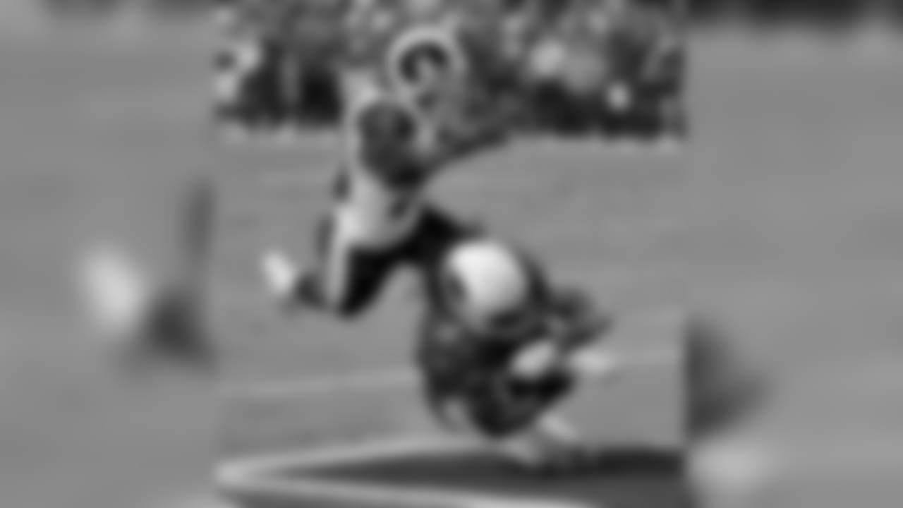 WR Larry Fitzgerald falls into the endzone for a touchdown