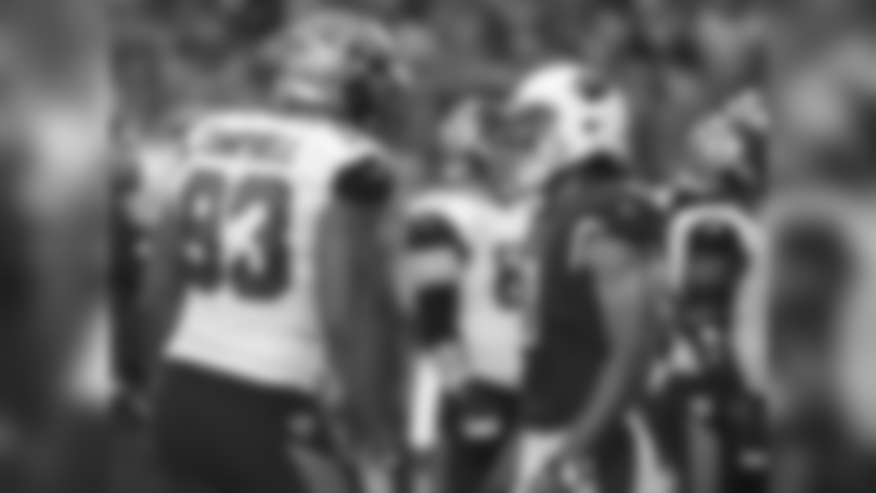 Jaguars DE Calais Campbell (left) and Cardinals WR Larry Fitzgerald (right)