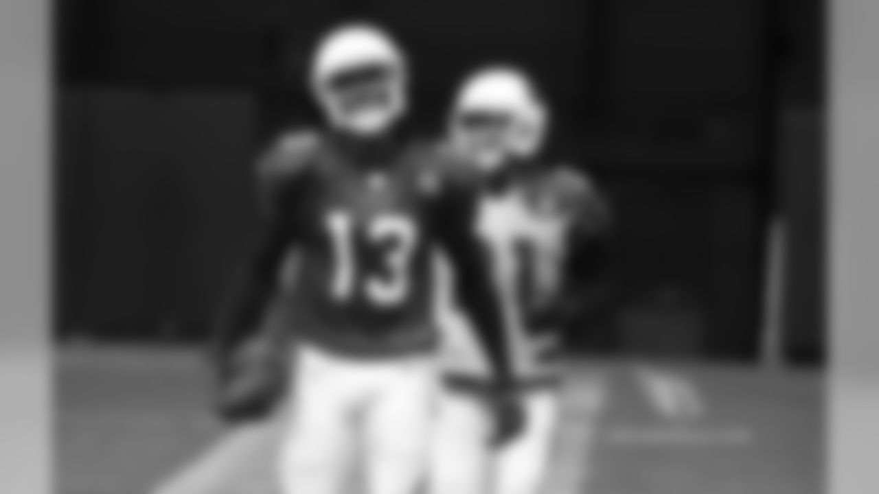WR Jaron Brown and CB Patrick Peterson have a chuckle