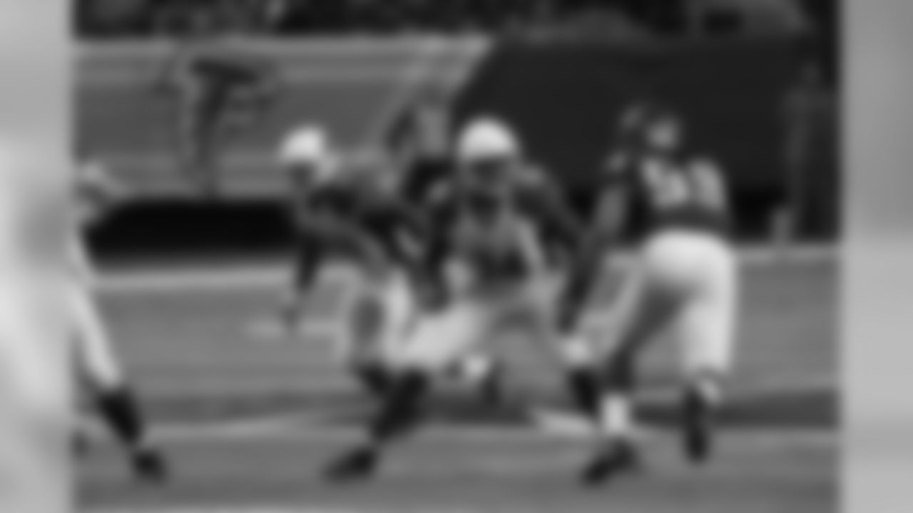 RT D.J. Humphries protects