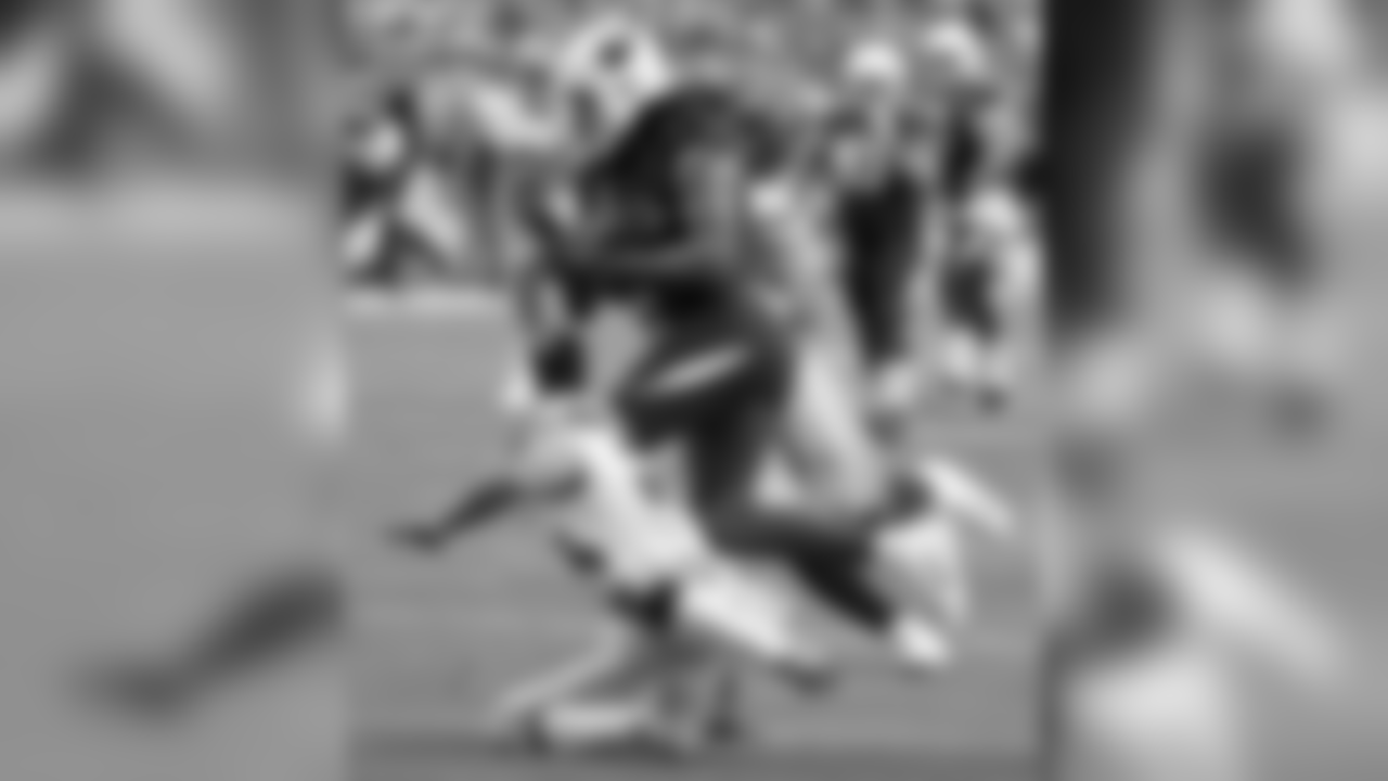 Larry Fitzgerald runs for extra yardage after the catch