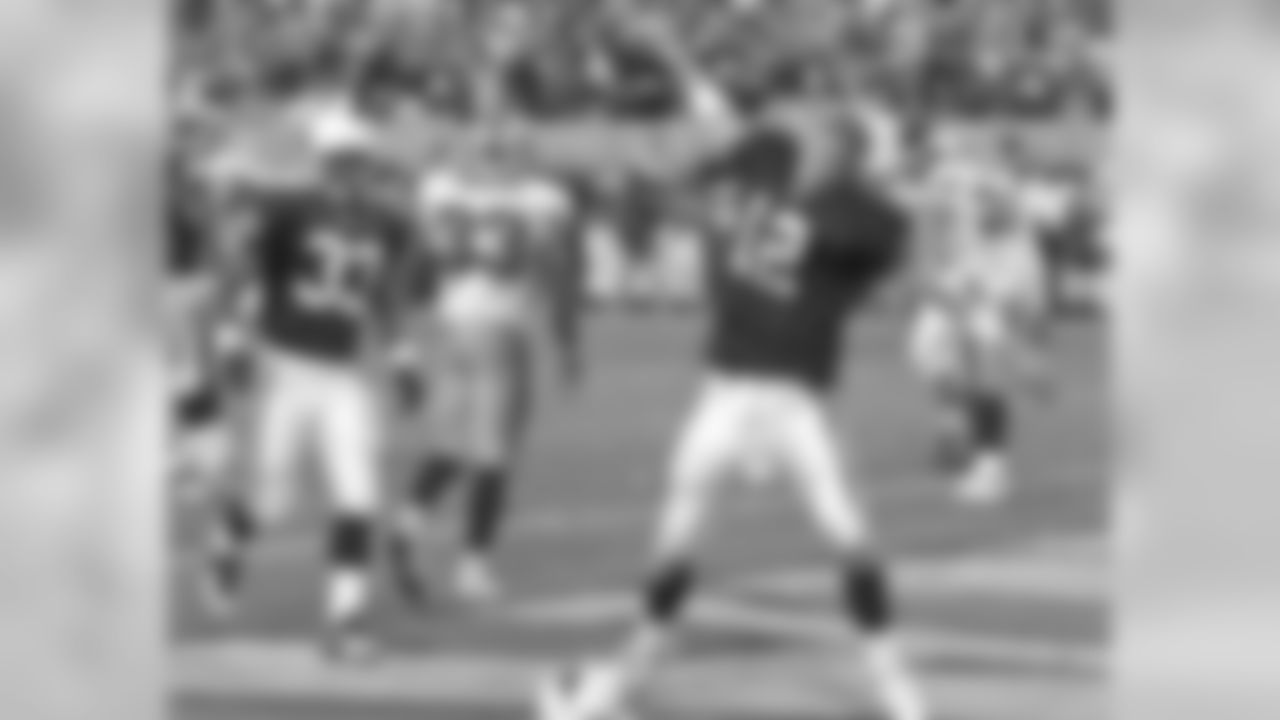 2004: QB Josh McCown spikes the ball following a two-point conversion