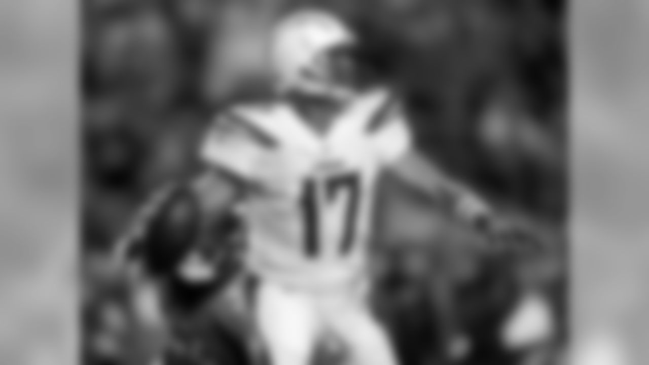 Los Angeles Chargers quarterback Philip Rivers (17) scrambles against the Denver Broncos during the first half of an NFL football game, Monday, Sept. 11, 2017, in Denver. (AP Photo/David Zalubowski)