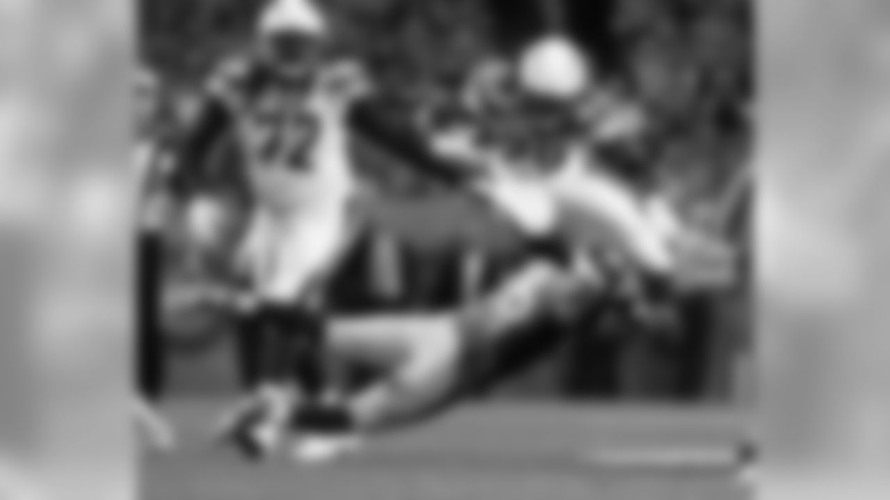 Los Angeles Chargers running back Melvin Gordon (28) is hit by Denver Broncos free safety Darian Stewart (26) during the first half of an NFL football game, Monday, Sept. 11, 2017, in Denver. (AP Photo/Jack Dempsey)
