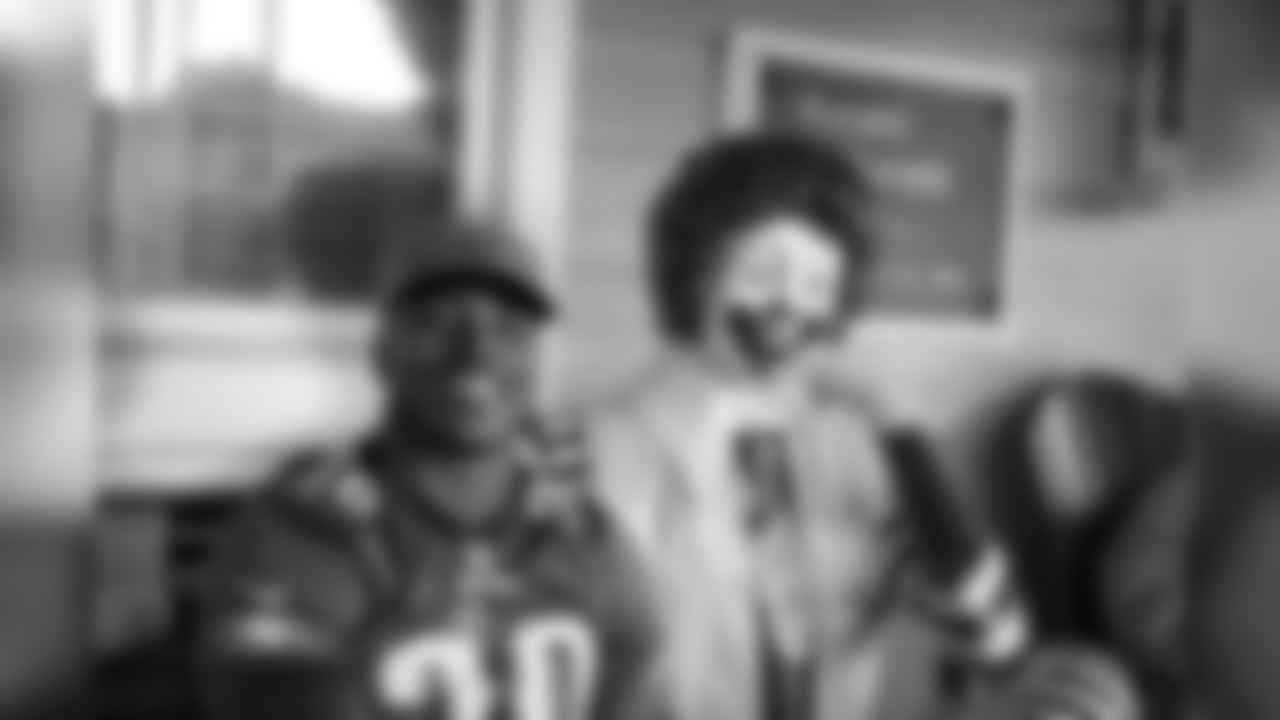 RB Corey Clement hangs out with Ronald McDonald.