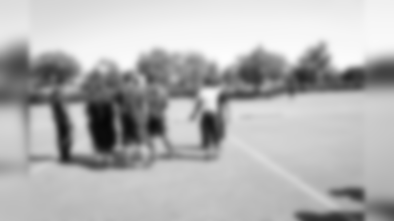 The students were eager to meet the team following practice.