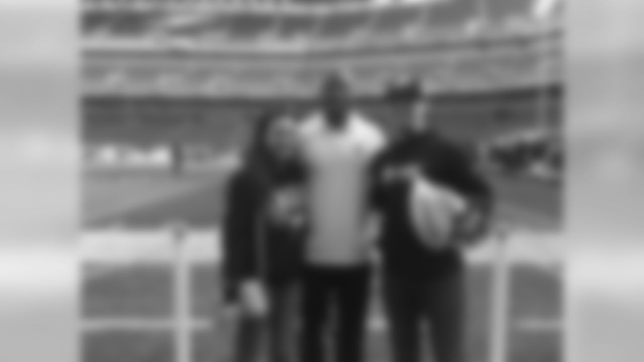 Correll Buckhalter takes a photo with Bud Light Up for Whatever participants