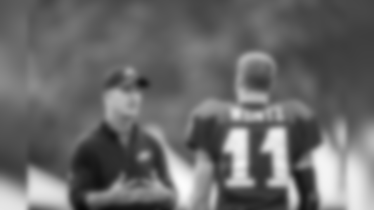 Offensive coordinator Frank Reich and QB Carson Wentz