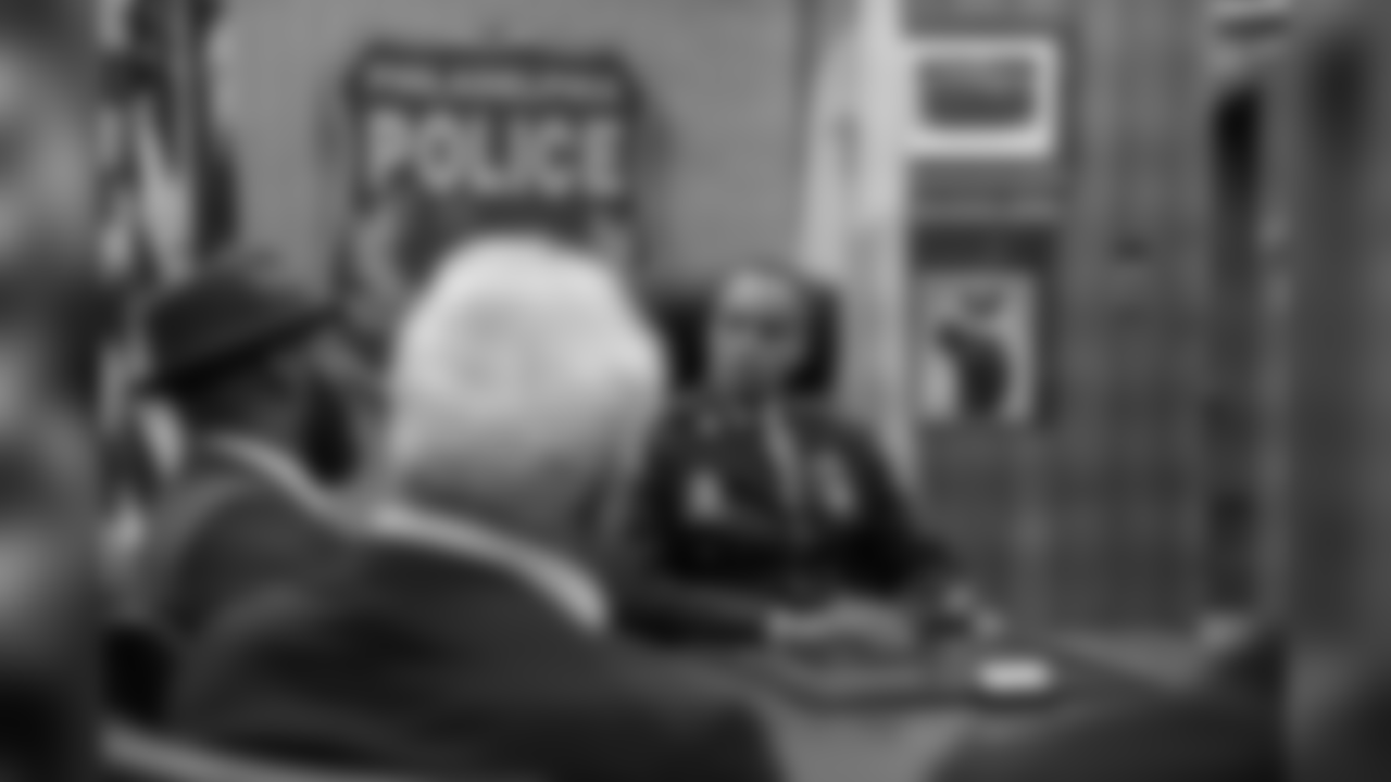 Malcolm Jenkins speaks to Ross Jr. and Eagles Chairman and CEO Jeffery Lurie at the Philadelphia Police Department.