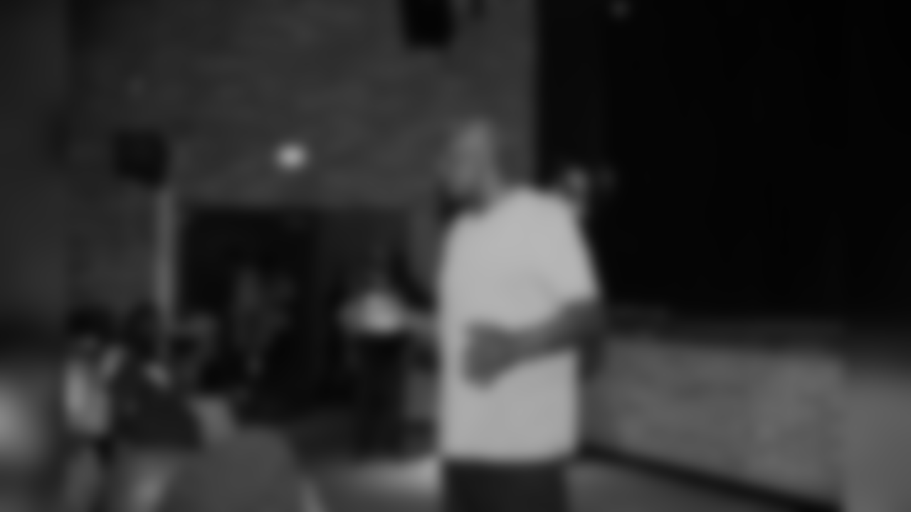 Harold Carmichael lends some words of advice to the Raines students