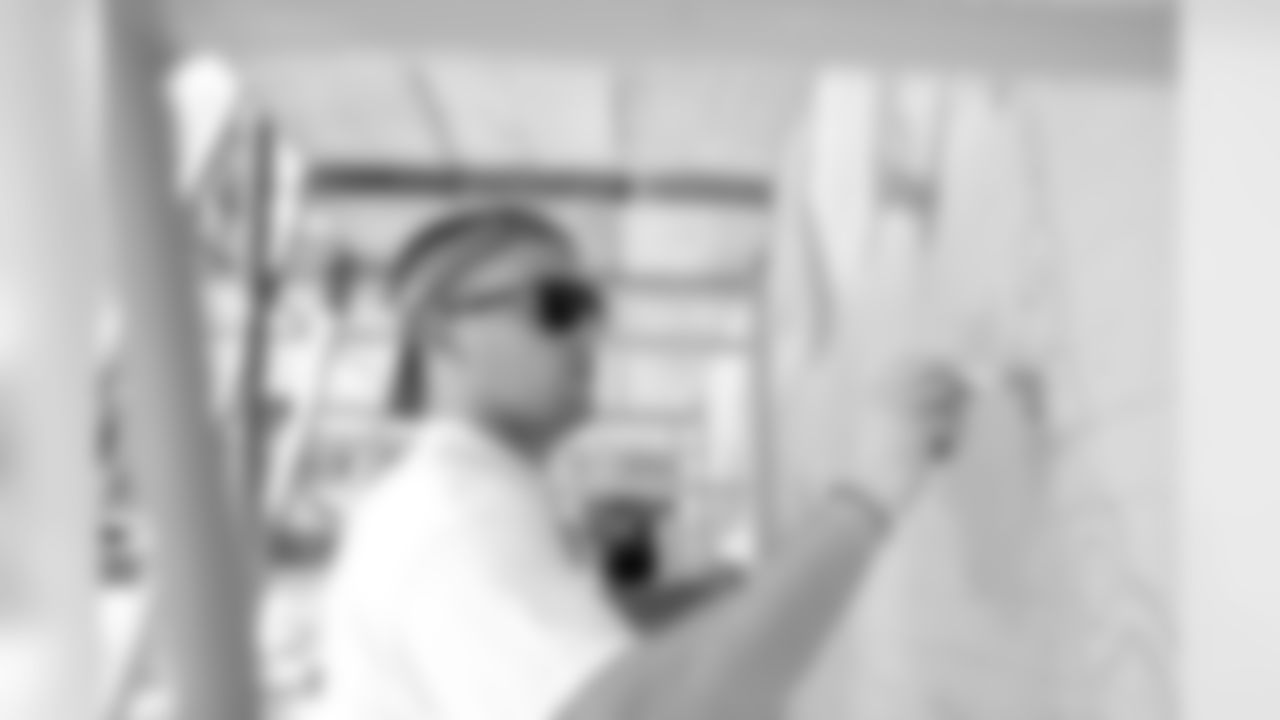 Zach Ertz adding his art to the mural.
