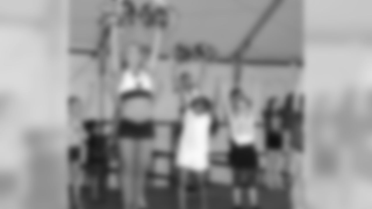 Jillian instructing a Junior Cheer Clinic in HeadHouse Plaza.