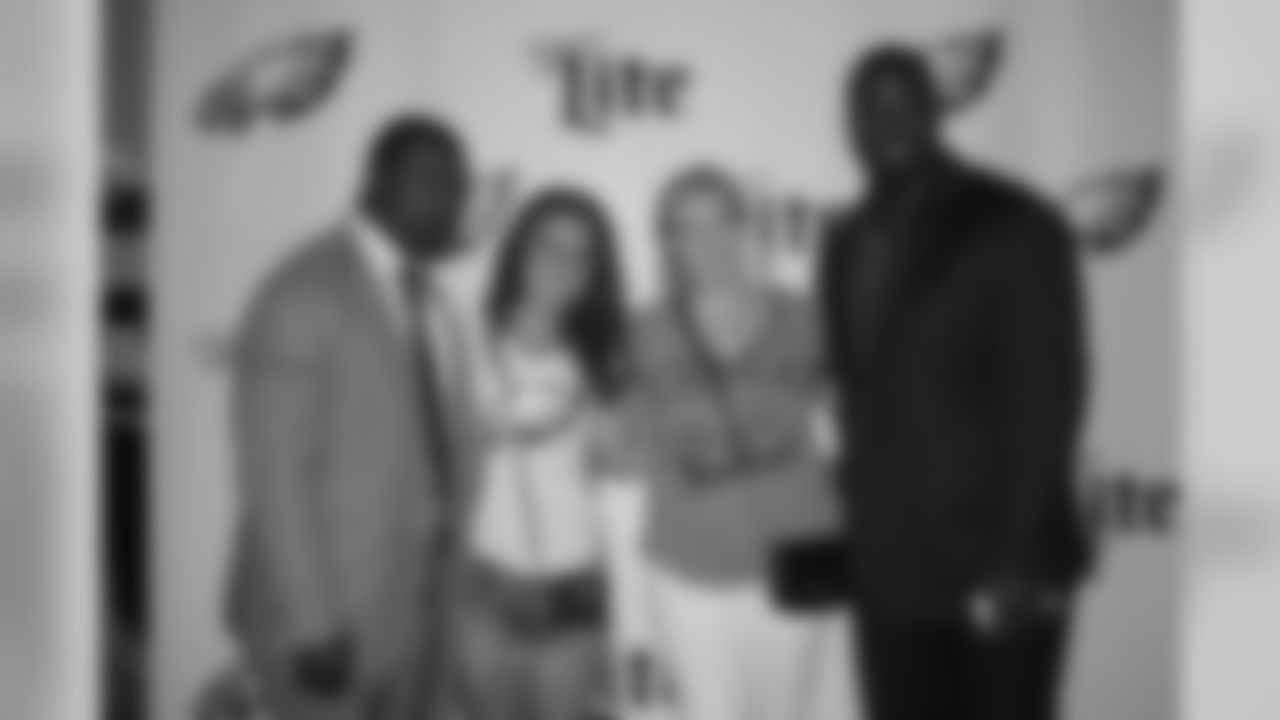 Westbrook and Trotter take another photo with fans