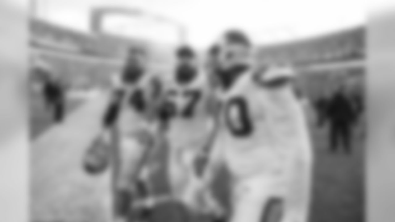 T Mike Remmers, C Ryan Kalil and G Trai Turner