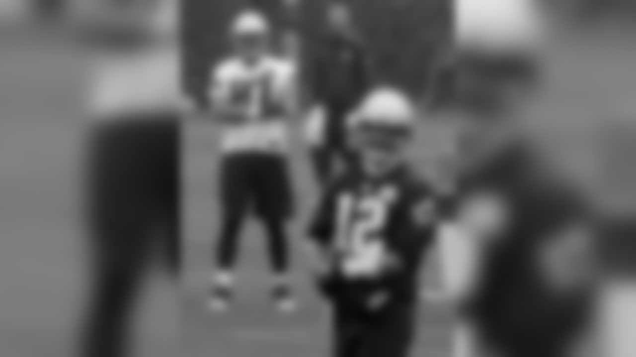 New England Patriots tight end Rob Gronkowski (87) watches quarterback Tom Brady (12) during an NFL football organized team activities practice Thursday, May 25, 2017, in Foxborough, Mass. (AP Photo/Bill Sikes)