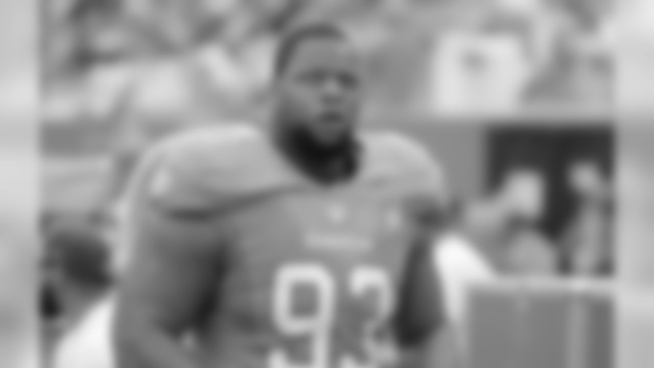 Miami Dolphins defensive tackle Ndamukong Suh (93) walks the sidelines during the first half of an NFL football game against the New England Patriots, Sunday, Jan. 3, 2016 in Miami Gardens, Fla. (AP Photo/Wilfredo Lee)