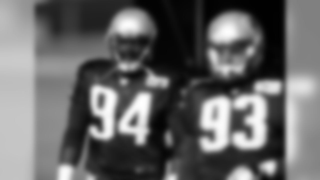 New England Patriots defensive tackle Ricky Jean Francois, back, takes part in drills before practicing with defensive end Lawrence Guy Wednesday, Nov. 15, 2017, on the campus of the Air Force Academy in Air Force Academy, Colo. The Patriots are practicing at Air Force, which is located at an elevation of 7,200 feet, to prepare to face the Oakland Raiders during an NFL football game Sunday in Mexico City, which sits at an elevation of almost 7,400 feet above sea level. (AP Photo/David Zalubowski)