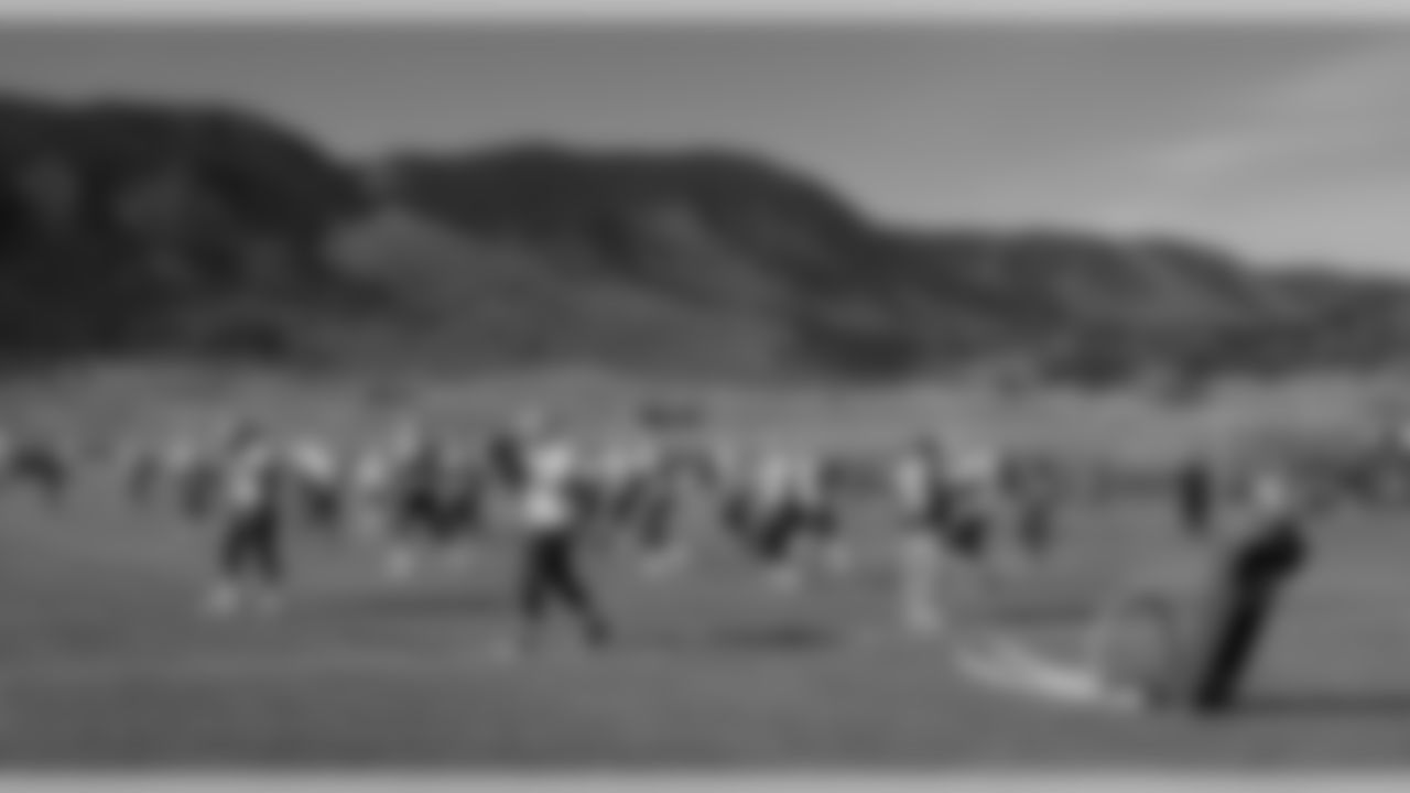 With the surrounding mountains in the background, the New England Patriots take part in drills at NFL football practice, Wednesday, Nov. 15, 2017, on the campus of the Air Force Academy in Air Force Academy, Colo. The Patriots are practicing at Air Force, which is located at an elevation of 7,200 feet, to prepare to face the Oakland Raiders during an NFL football game Sunday in Mexico City, which sits at an elevation of almost 7,400 feet above sea level. (AP Photo/David Zalubowski)